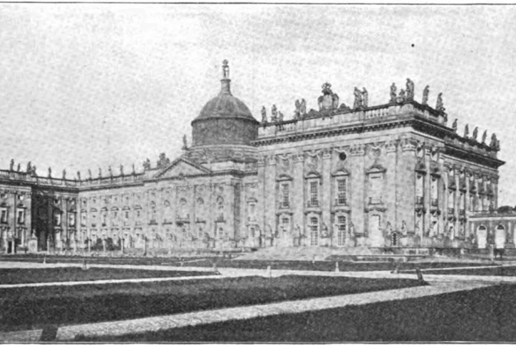 Photograph of the Berlin Castle showing a large baroque palace with statues lining the roof and a central dome.