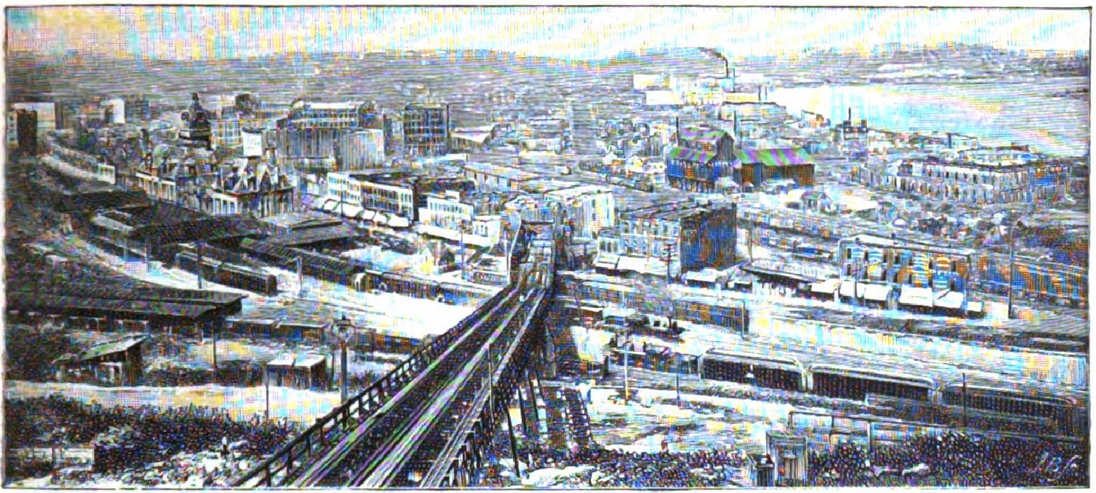 Panoramic view of Kansas City with buildings, streets, and railway lines