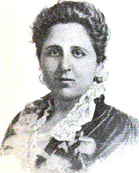 Woman with Victorian hairstyle in high-necked dress with light collar