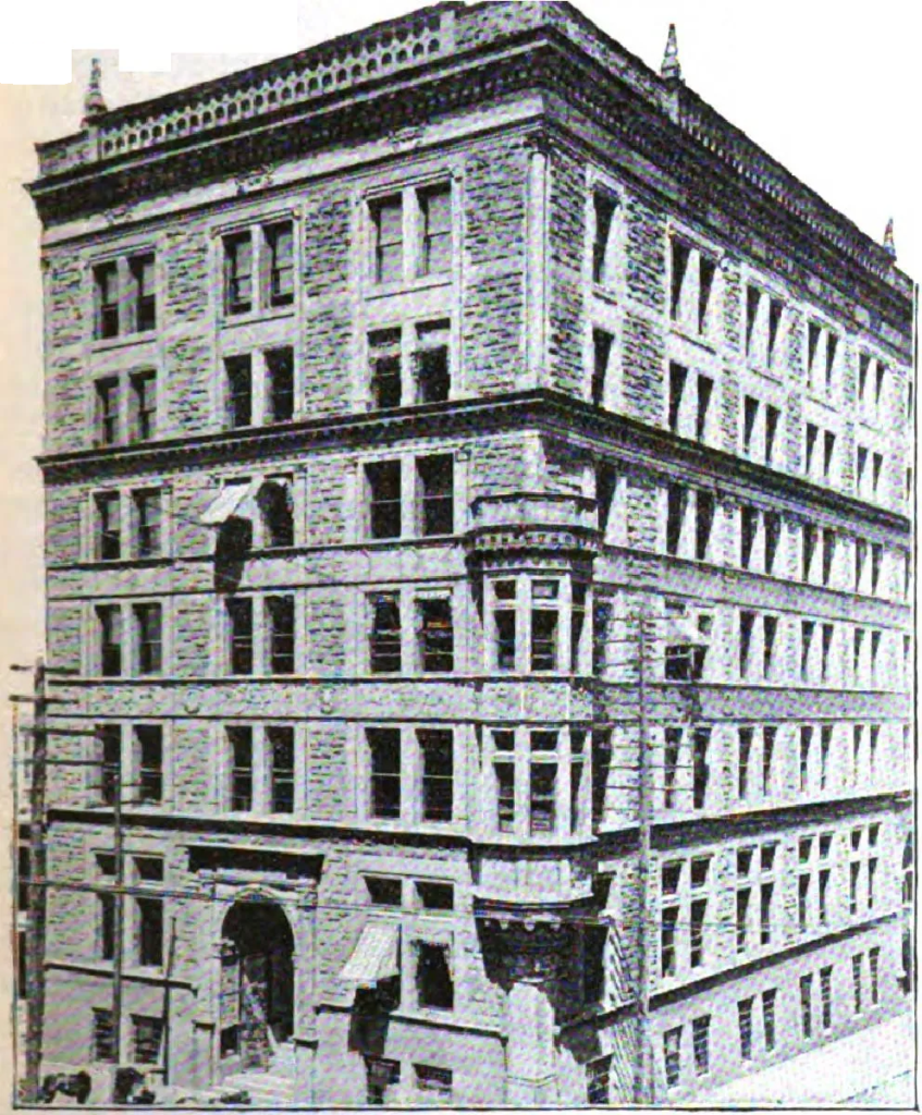 Multi-story office building with regular windows and classical design